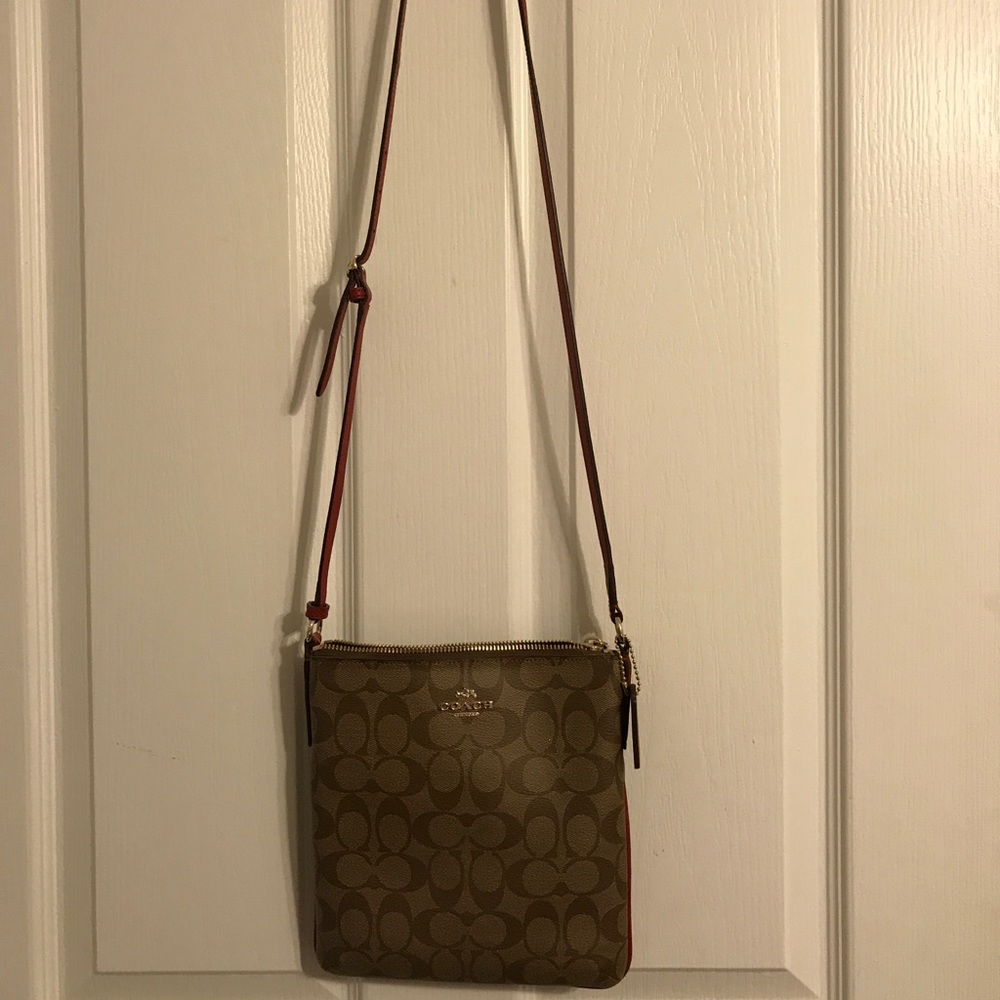 NWT Coach purse with red accent